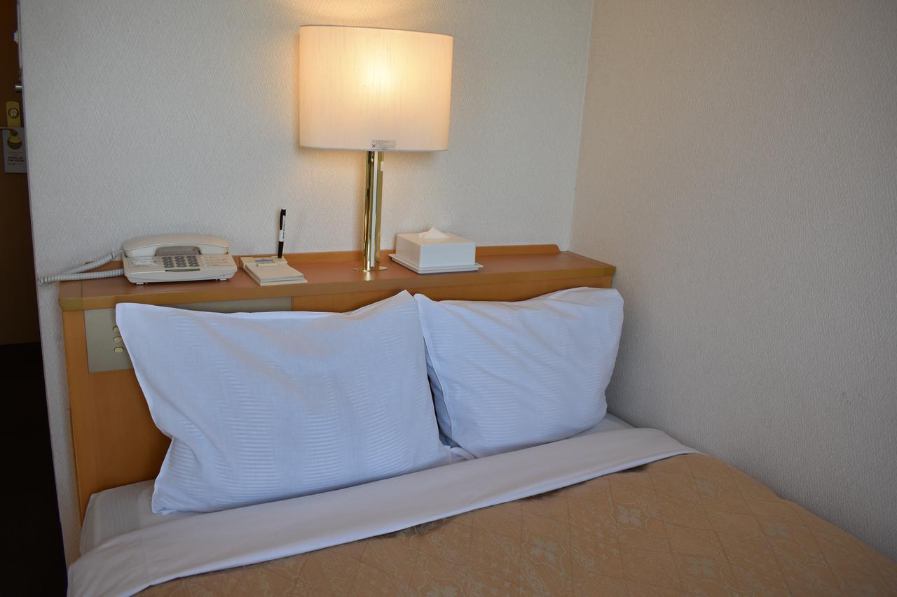 Hotel Crown Hills Toyokawa Bagian luar foto